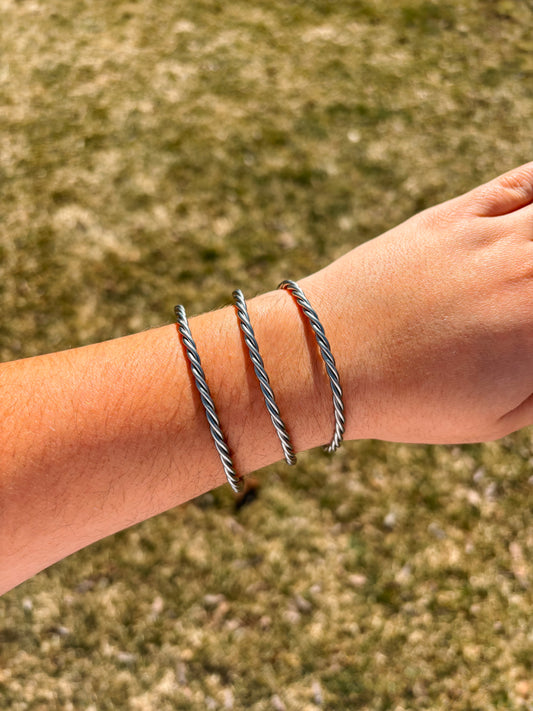 Sterling silver twisted rope cuff bracelet with rustic western design