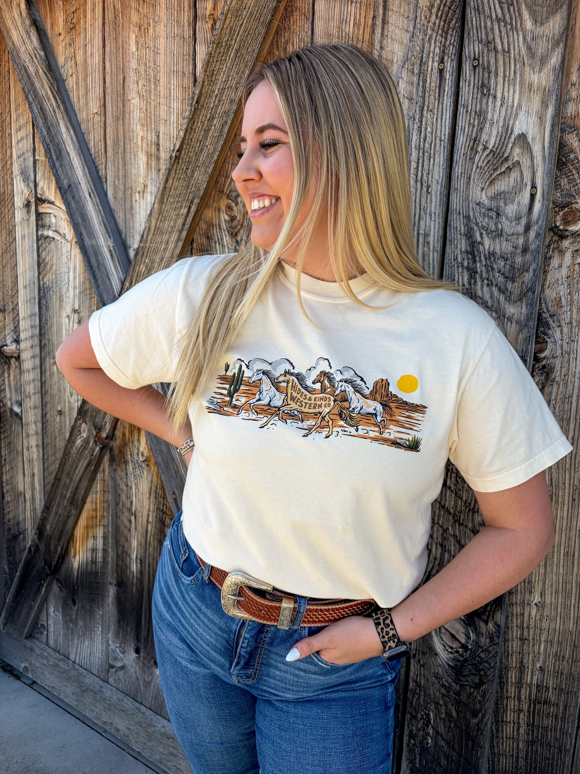 Cream western graphic tee with running horses design from Hides & Kinds Wild Run Tee collection